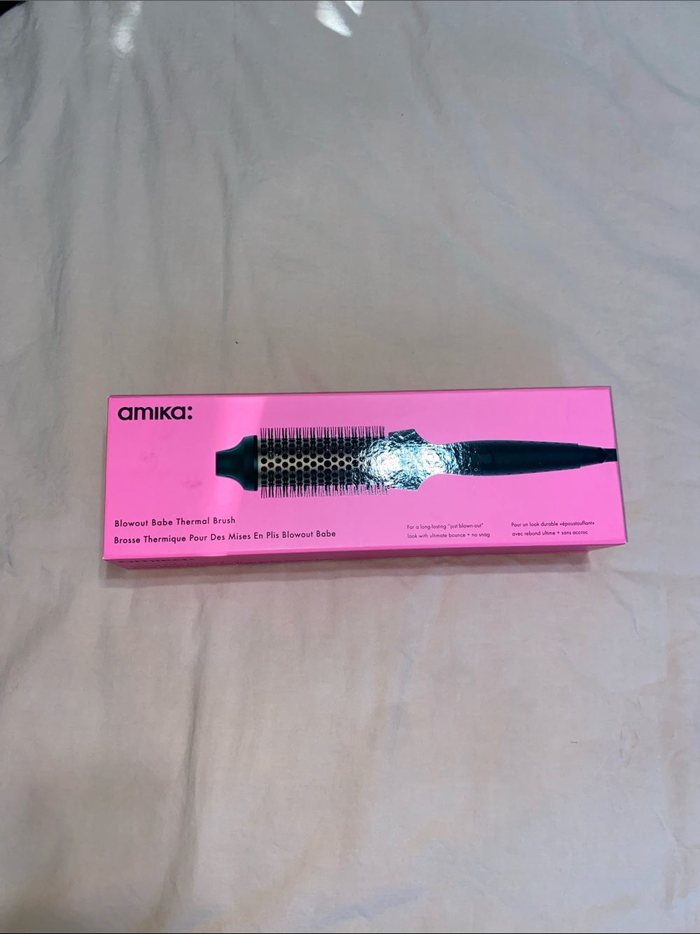 amika Thermal Round Styling Brush in Bright Pink Packaging